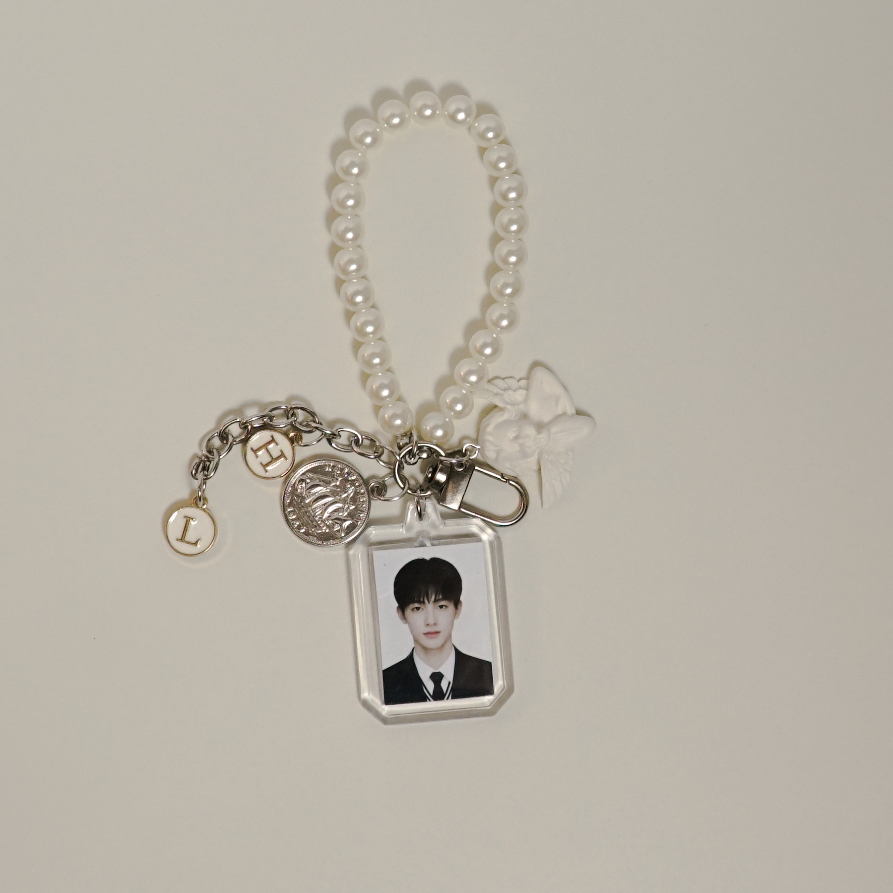 Fanmade CORTIS photocard keychain with pearl strap and charm details